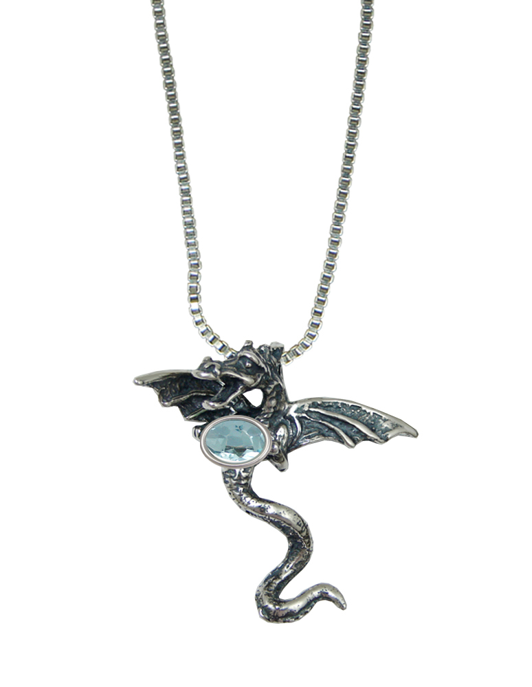 Sterling Silver Dramatic Dragon Pendant With Faceted Blue Topaz